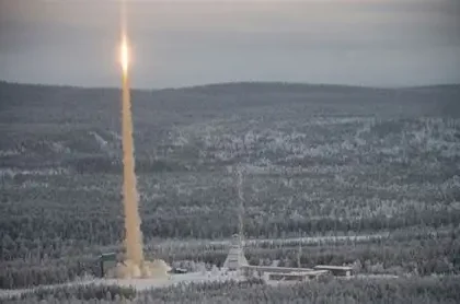 Rocket launch at Esrange Space Centre in Swedish Lapland under dark Arctic sky