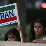 Rescue teams searching through rubble after airstrike hit school in Minab