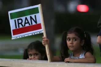 Rescue teams searching through rubble after airstrike hit school in Minab