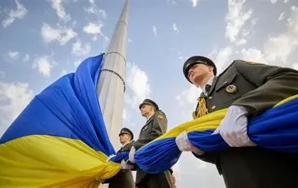 Ukrainian female soldier in uniform at frontline position after four years of war