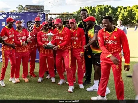 Zimbabwe cricket players celebrating a wicket during a World Cup match