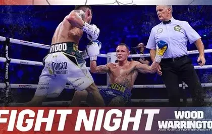 Leigh Wood celebrates his unanimous decision victory over Josh Warrington in Nottingham's Motorpoint Arena while Warrington looks on, exhausted.