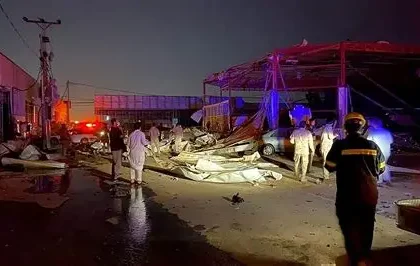 Fire and smoke rising near a hotel in Dubai after Iranian missile debris fell during airstrike