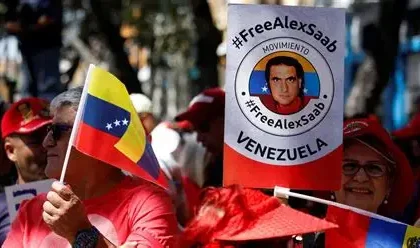 Venezuelan political prisoners and their families demonstrate outside a prison in Caracas after a new amnesty law was passed.