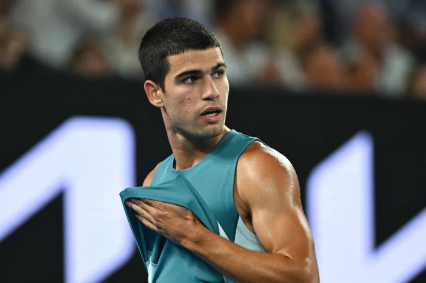 Carlos Alcaraz storms to a 50-minute victory over Arthur Fils to win the Qatar Open, extending his unbeaten 2026 streak.