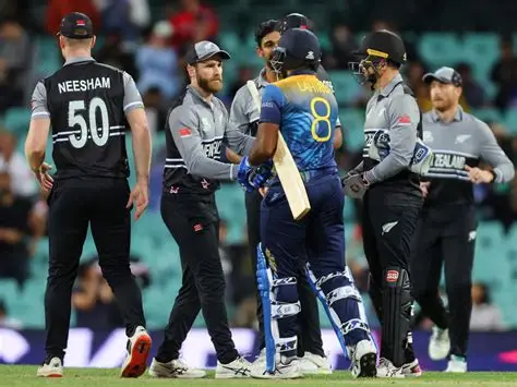 New Zealand players celebrate as Sri Lanka collapses in T20 World Cup Super 8 match