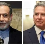 US and Iranian flags displayed during diplomatic meeting