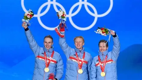 Norwegian athletes celebrating gold medals at the 2026 Winter Olympics