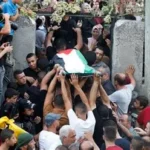 Funeral for members of the Bani Odeh family in Tammun, West Bank.