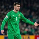 Italy and Northern Ireland players competing in a World Cup play-off match