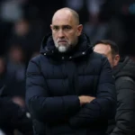 Tottenham Hotspur Stadium and players during a Premier League match amid relegation fears
