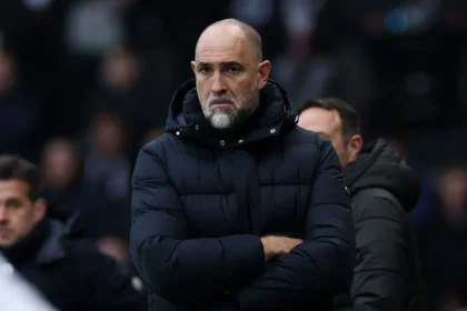 Tottenham Hotspur Stadium and players during a Premier League match amid relegation fears