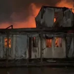 Emergency responders at a Kabul drug rehabilitation hospital after an air strike.