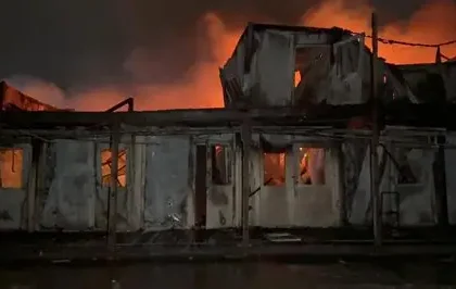 Emergency responders at a Kabul drug rehabilitation hospital after an air strike.