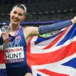 Amy Hunt celebrating after winning silver medal in 200m race