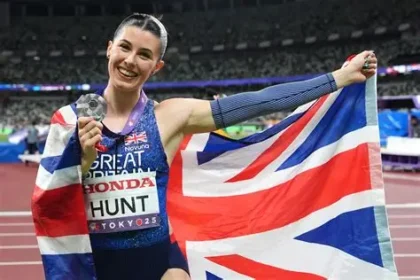 Amy Hunt celebrating after winning silver medal in 200m race