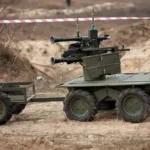 Ukrainian armed UGV firing at Russian armored personnel carrier