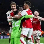 Arsenal players reacting after conceding a set-piece goal against Bayer Leverkusen