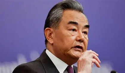 Australian businessman leaving court after foreign interference conviction.