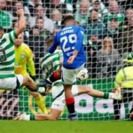 Celtic players celebrate after beating Rangers in Scottish Cup penalty shootout
