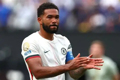 Chelsea captain Reece James celebrates a goal at Stamford Bridge.