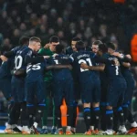 Chelsea players gather for a pre-match huddle before a Premier League match.