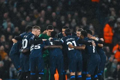 Chelsea players gather for a pre-match huddle before a Premier League match.