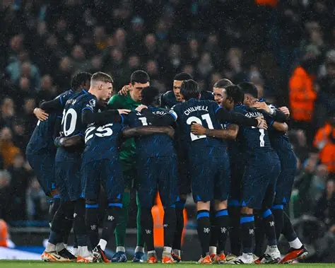 Chelsea players gather for a pre-match huddle before a Premier League match.