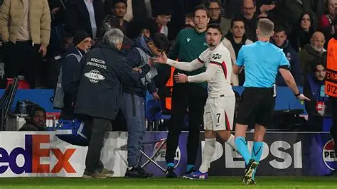 Pedro Neto pushes ball boy during Chelsea vs PSG match