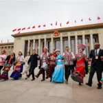 Chinese President Xi Jinping attending the National People's Congress meeting discussing the ethnic unity law