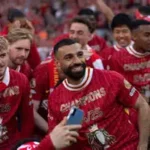 Jonny Clayton celebrating after defeating Luke Humphries in the Premier League darts final in Nottingham.