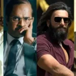 Crowded Indian cinema hall with audiences cheering during a Bollywood action film screening