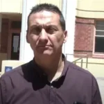 Police officers at a rural property in Victoria during operation to capture Dezi Freeman