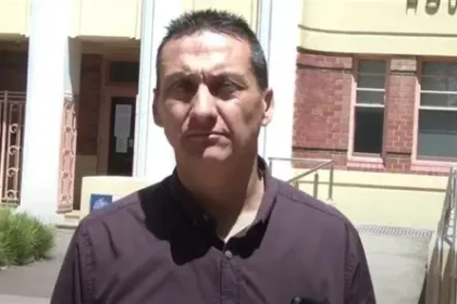 Police officers at a rural property in Victoria during operation to capture Dezi Freeman