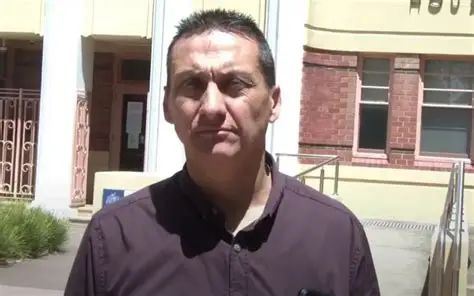 Police officers at a rural property in Victoria during operation to capture Dezi Freeman