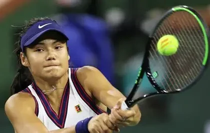 Emma Raducanu reacts during her straight-sets defeat to Amanda Anisimova at Indian Wells.