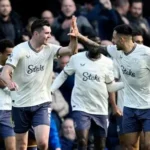 Everton manager David Moyes celebrates away victory with his team in Premier League match