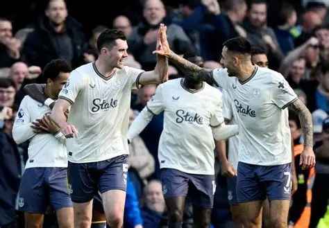 Everton manager David Moyes celebrates away victory with his team in Premier League match
