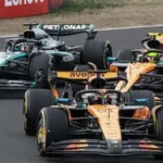 Formula 1 drivers battling for position during the Chinese Grand Prix with hybrid engine cars