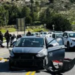 Car carrying Palestinian family after Israeli forces opened fire in West Bank town of Tammun.
