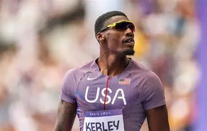 Fred Kerley competing in a 100m race at an athletics event