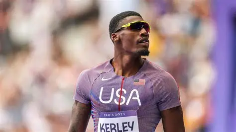 Fred Kerley competing in a 100m race at an athletics event