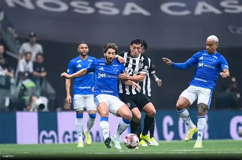 Players from Cruzeiro and Atletico Mineiro involved in a mass brawl during the Campeonato Mineiro final.