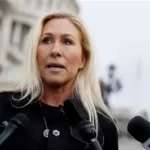 Campaign signs for Marjorie Taylor Greene in Georgia office