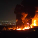 Stock market charts showing volatility as oil prices rise due to the Iran war