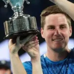 Henry Patten during a tennis match after returning from Dubai