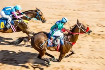 Horse racing event with diverse participants highlighting inclusion efforts