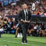 Igor Tudor directing Tottenham players during Premier League match, emphasizing defensive shape