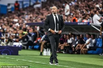 Igor Tudor directing Tottenham players during Premier League match, emphasizing defensive shape