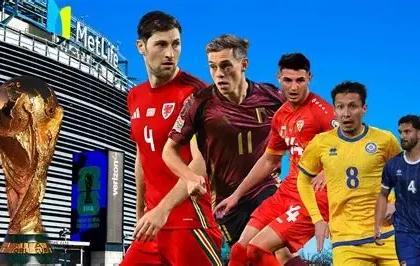 Wales players celebrating during a World Cup play-off match at Cardiff City Stadium
